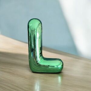 Ceramic L statuette